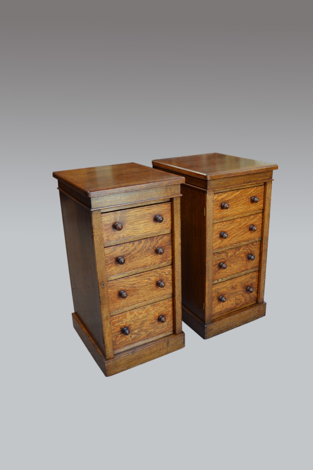 pair of Victorian oak wellington chests 
