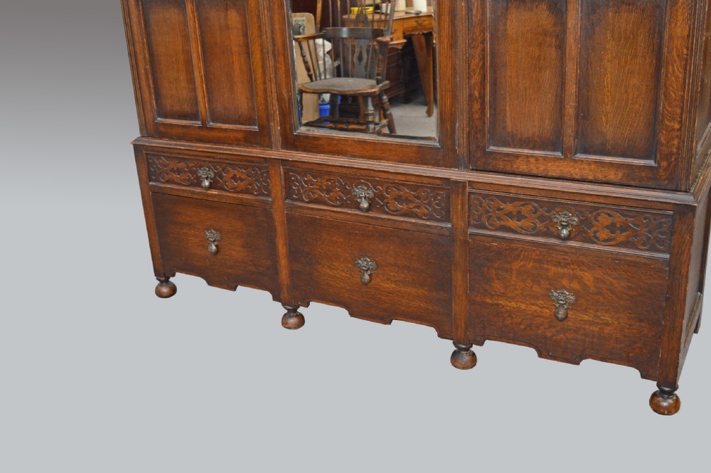 Oak Jacobean style triple wardrobe  View III