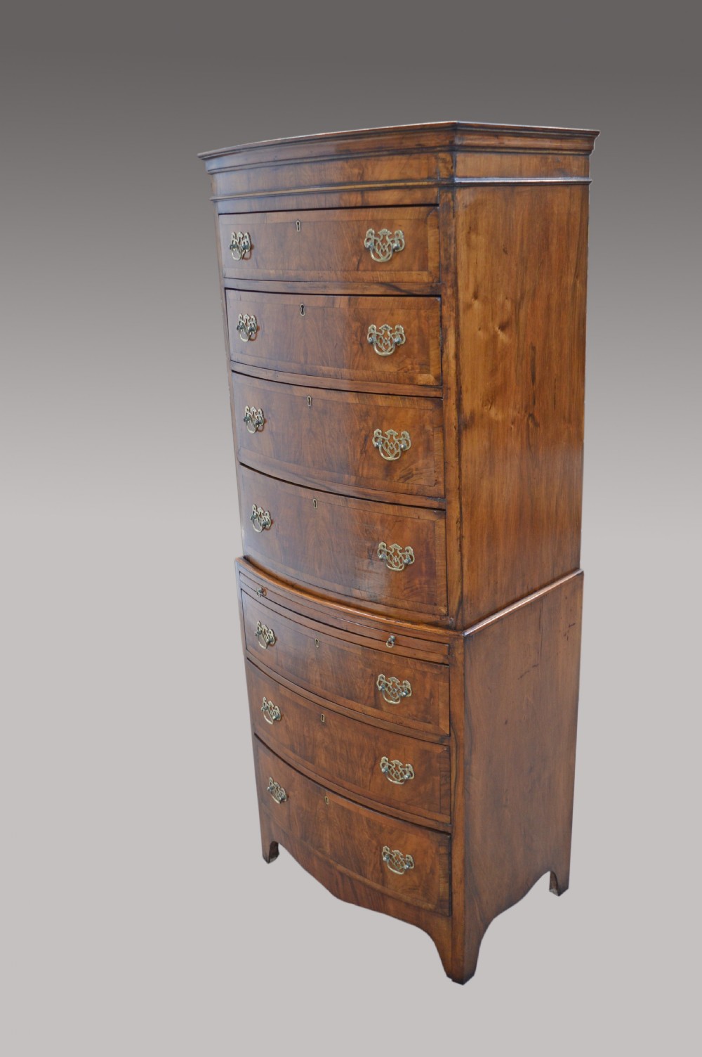 walnut bow front chest on chest  View II