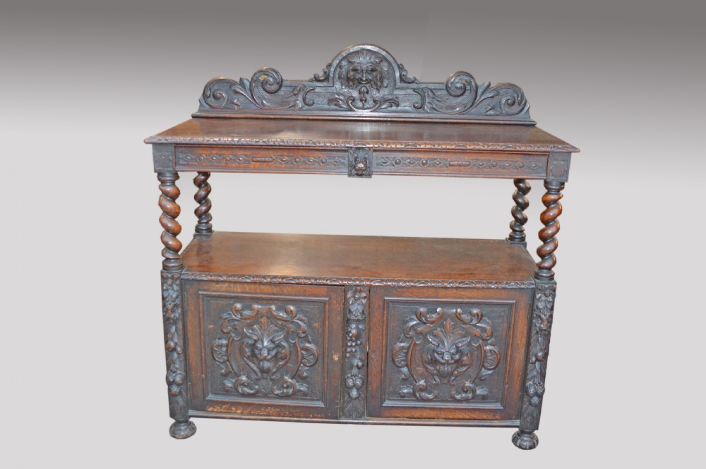 Antique green man  carved oak buffet 