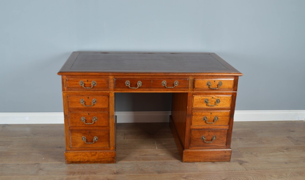 Edwardian walnut pedestal desk 