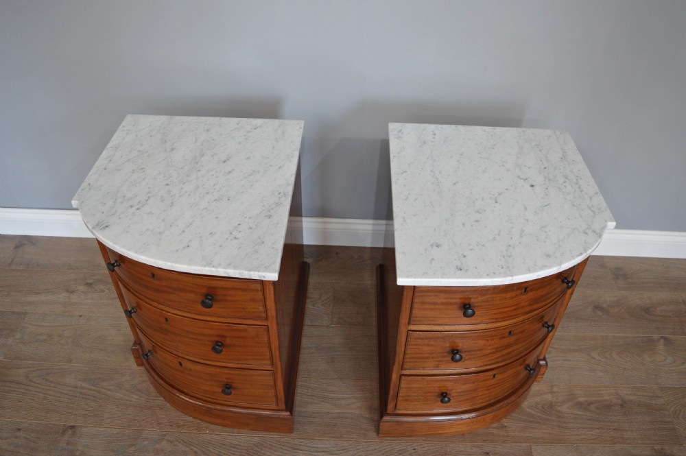 pair of Victorian marble top bow front bedside chests of drawers  View V
