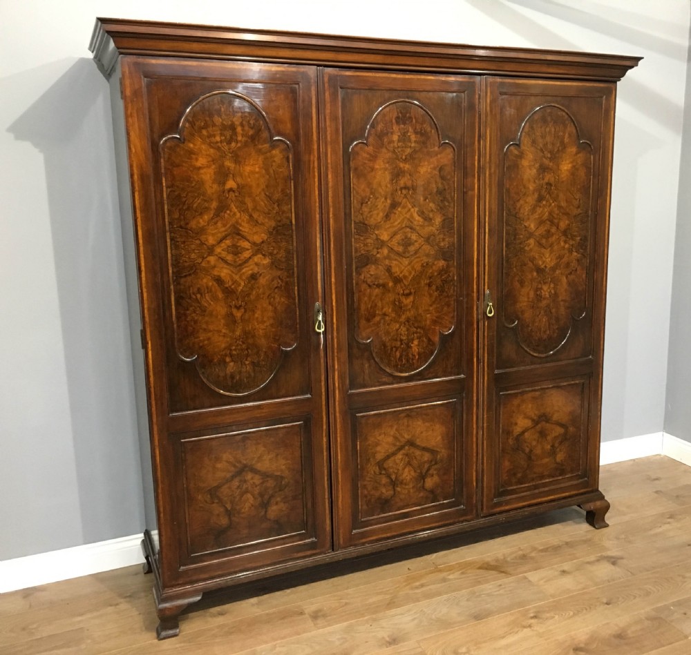 Antique walnut triple wardrobe Waring and Gillows 