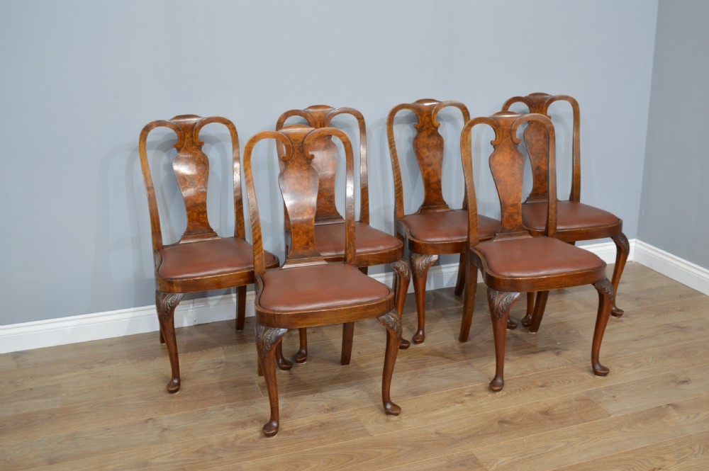 Antique walnut two leaf wind out dining table and 6 chairs by Merryweather of Holloway London  View V