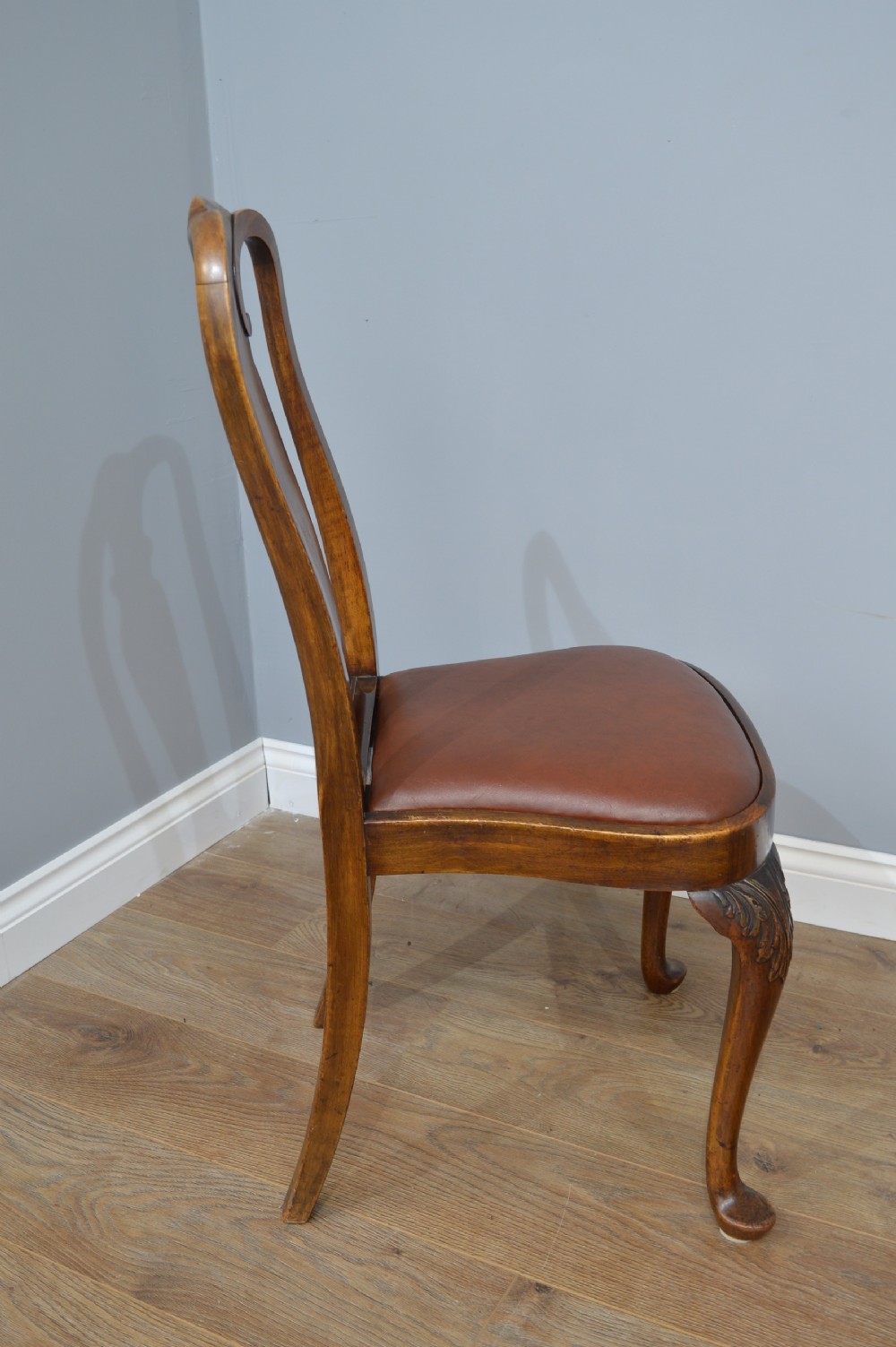 Antique walnut two leaf wind out dining table and 6 chairs by Merryweather of Holloway London  View VII