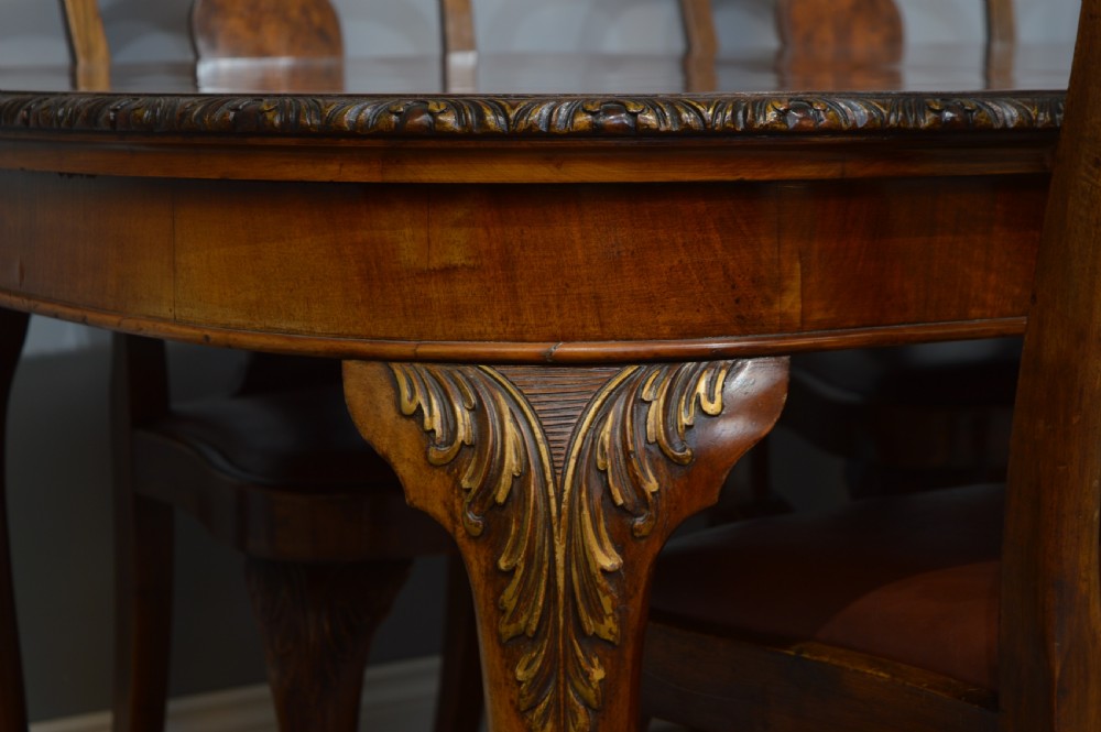 Antique walnut two leaf wind out dining table and 6 chairs by Merryweather of Holloway London  View IX