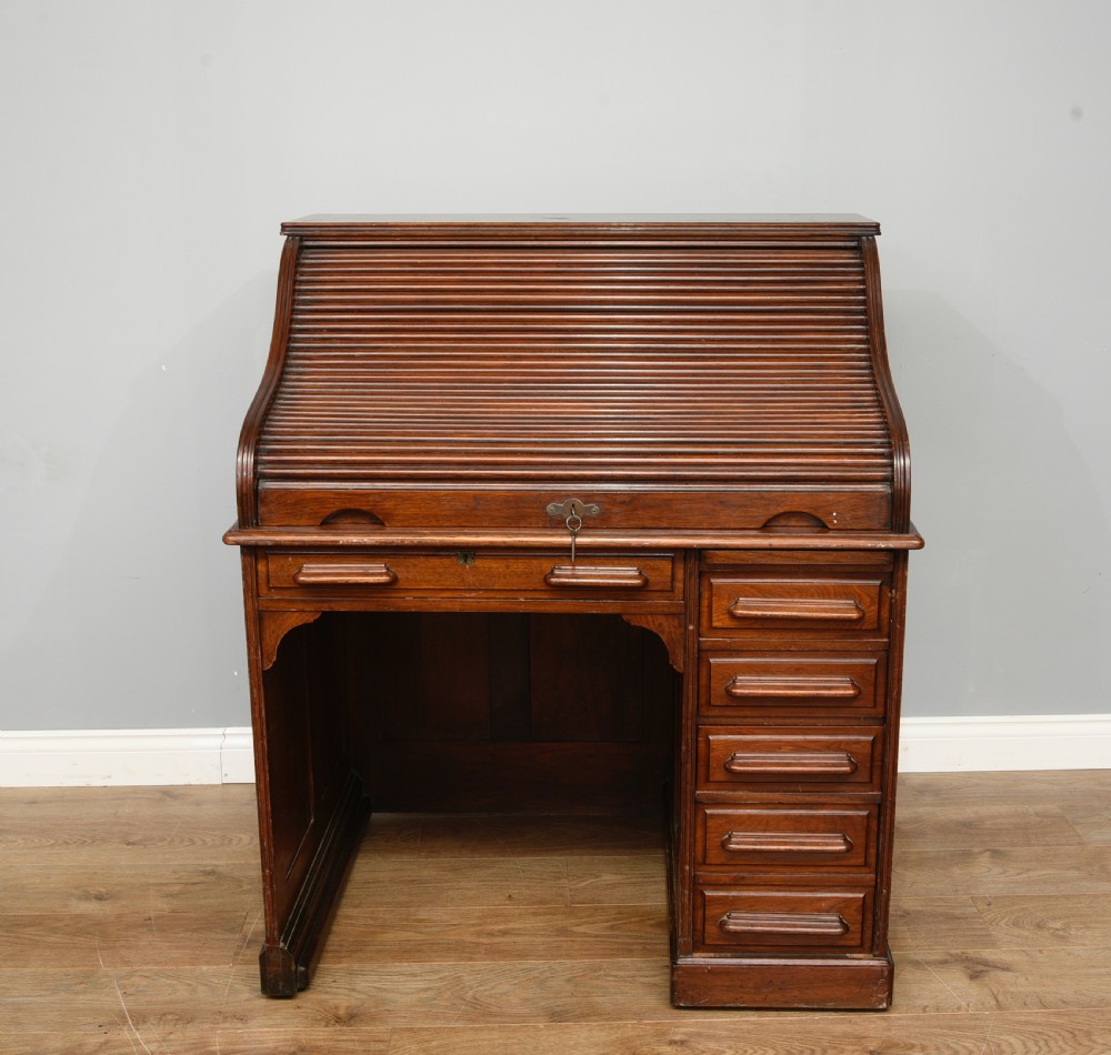 Antique mahogany roll top desk 