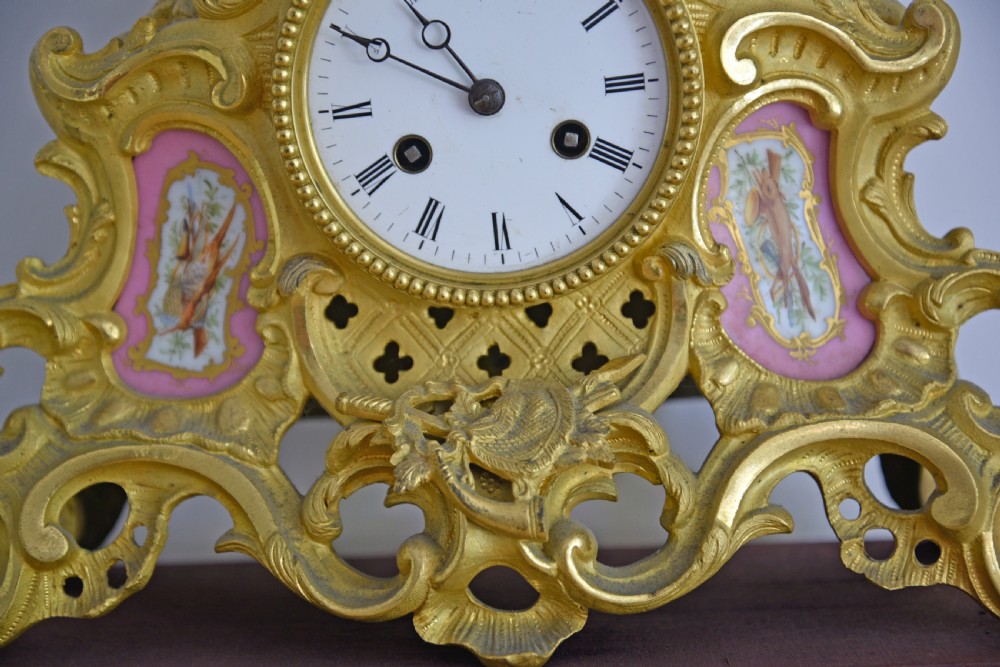 Antique French gilt bronze and Sevres porcelain mantle clock  View IV