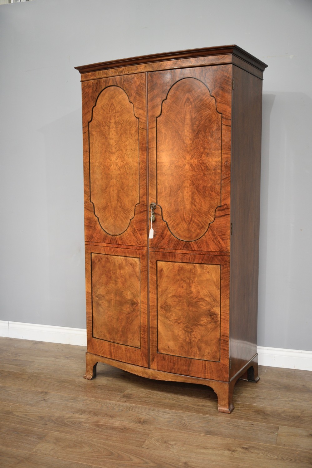 bur walnut bow front wardrobe maples & co 