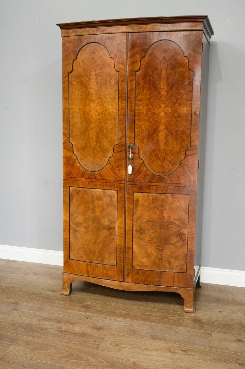 bur walnut bow front wardrobe maples & co  View II