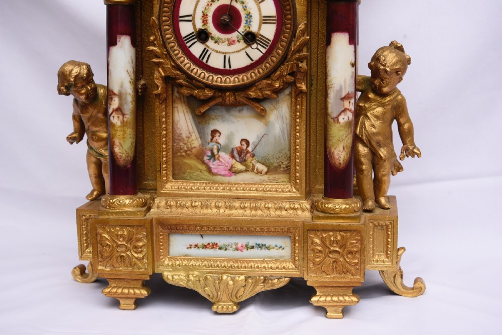 French gilt and sevres porcelain mantle clock  View II