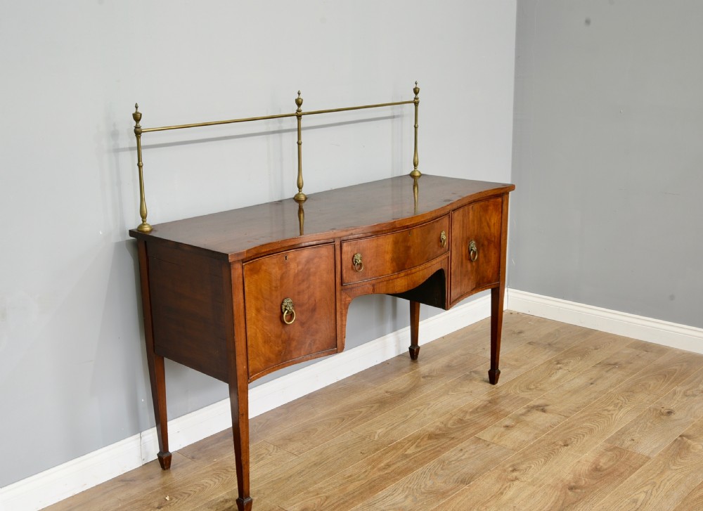 Georgian mahogany serpentine sideboard  View II