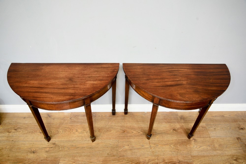 pair of antique Georgian mahogany deme-lune console hall tables View II