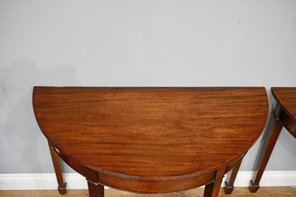 pair of antique Georgian mahogany deme-lune console hall tables View III