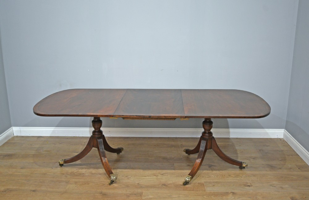 late 19th century Regency style mahogany twin pillar dining table 