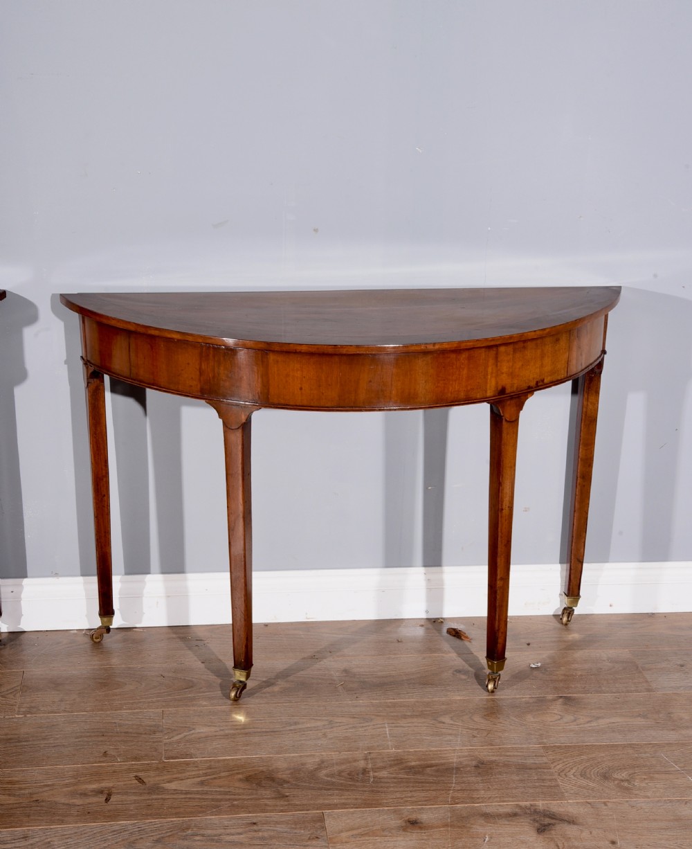 PAIR OF Georgian mahogany Demi lune console tables  View II