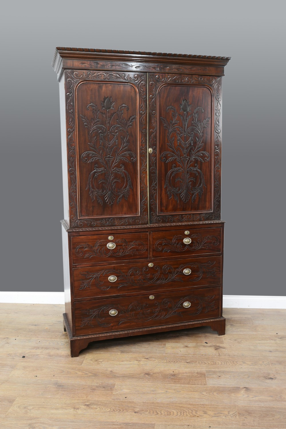 Antique 19th century carved mahogany linen press 