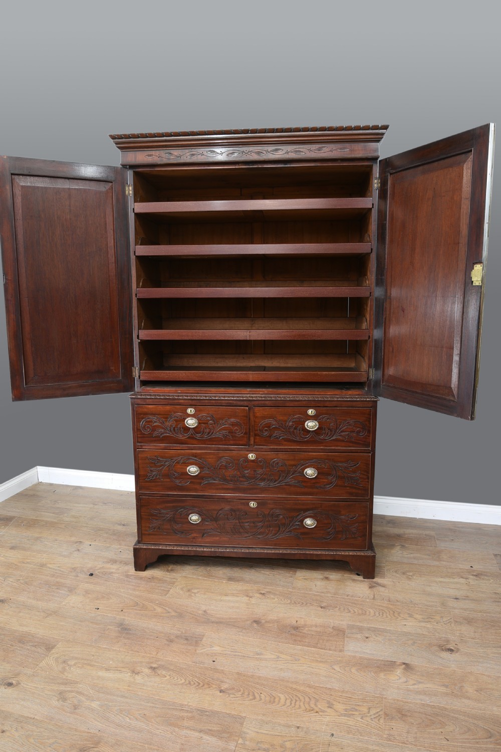 Antique 19th century carved mahogany linen press  View II