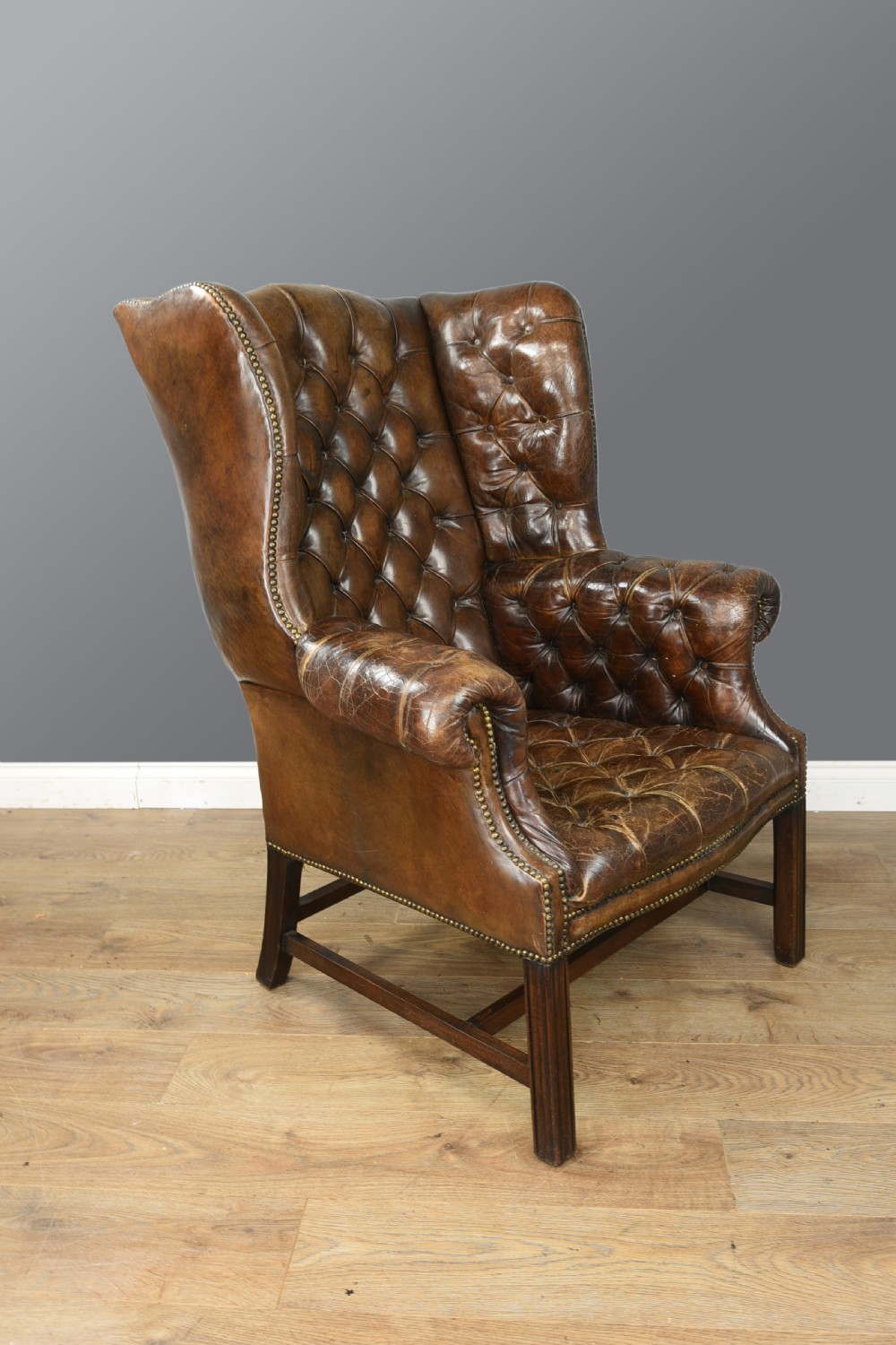 Antique leather wing chair  View III