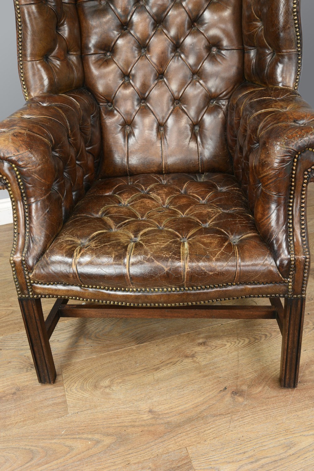 Antique leather wing chair  View IX