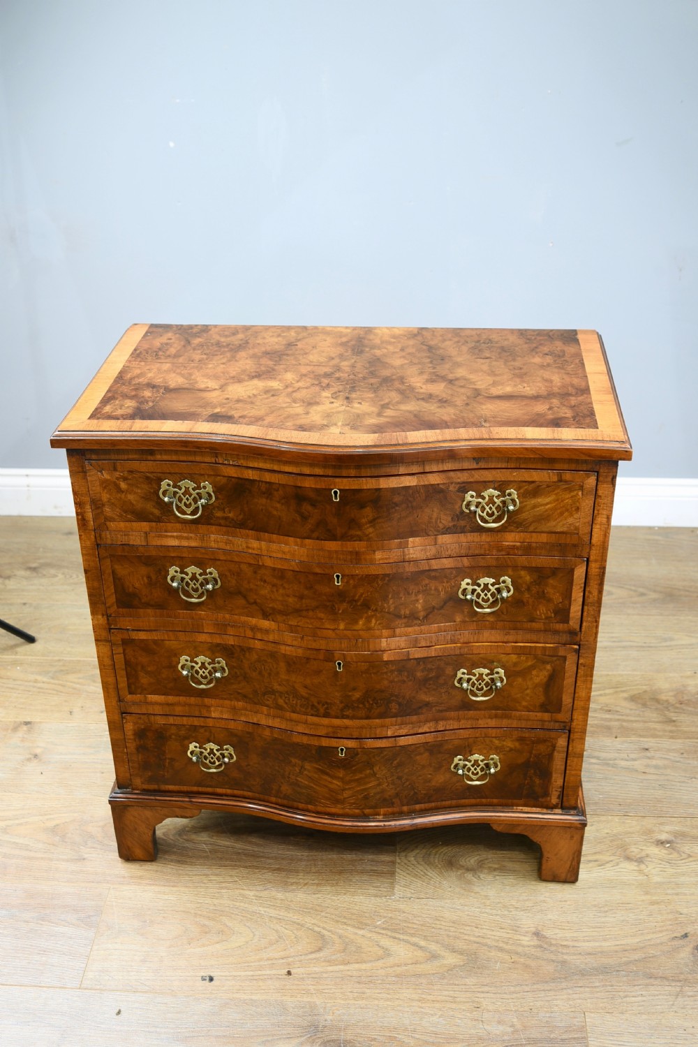 small Antique serpentine walnut chest of drawers  View II