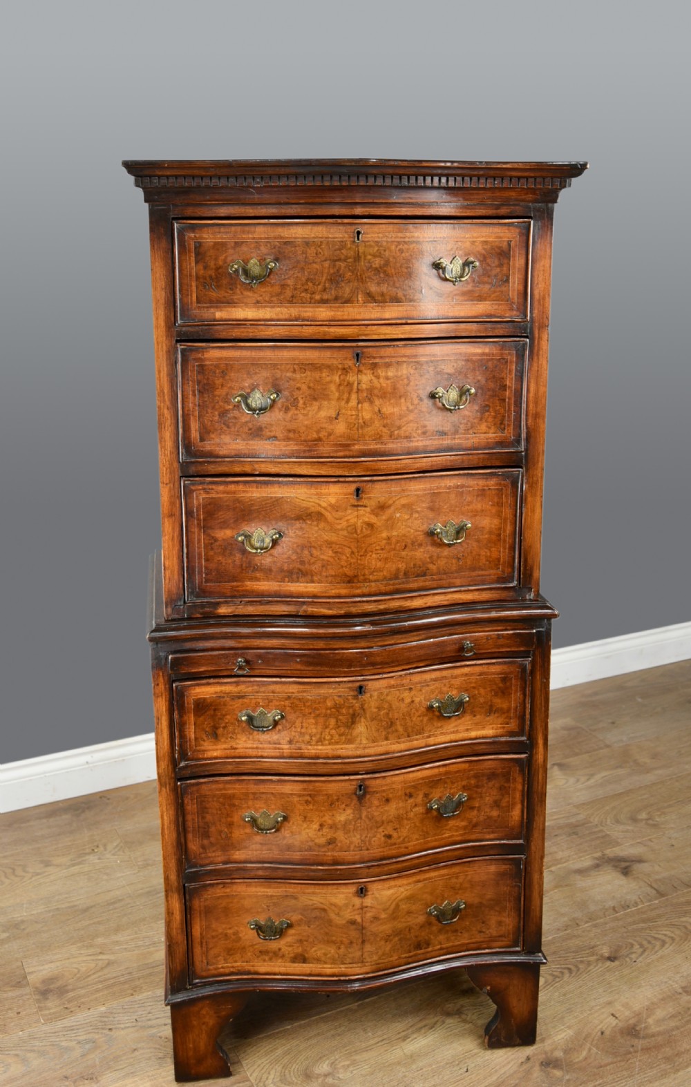small serpentine walnut chest on chest 