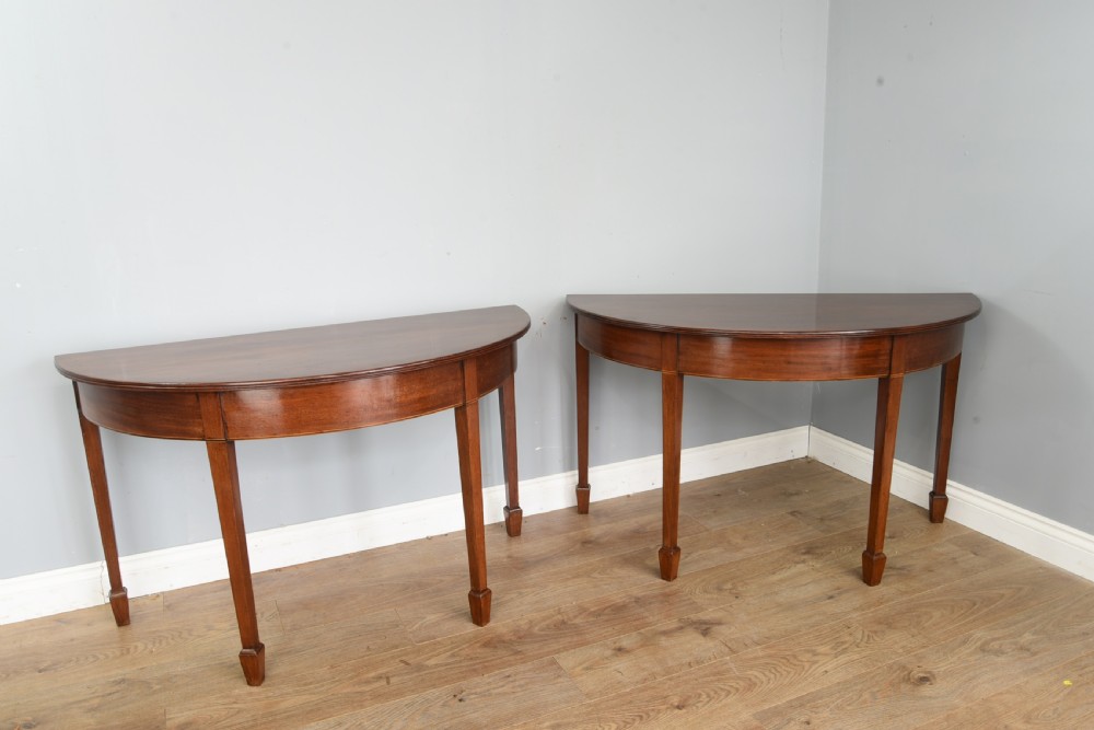 Antique pair of georgian mahogany demi lune console tables 