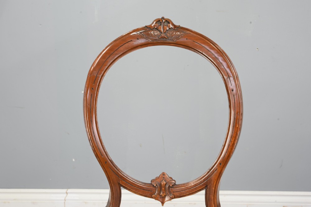 set of six Victorian walnut balloon back chairs  View VI
