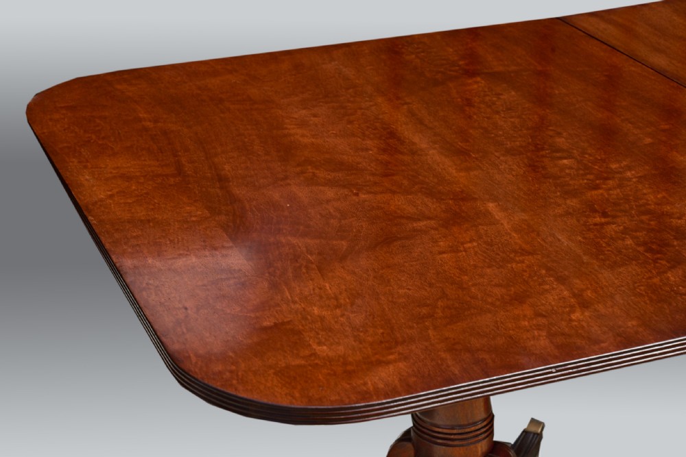 Antique Regency style extending twin pillar dining table  View III