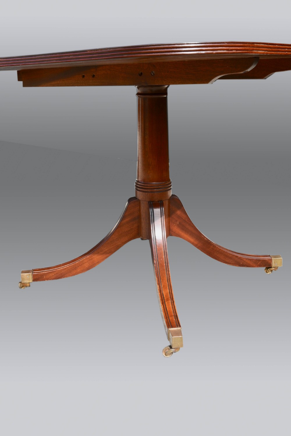 Antique Regency style extending twin pillar dining table  View IV