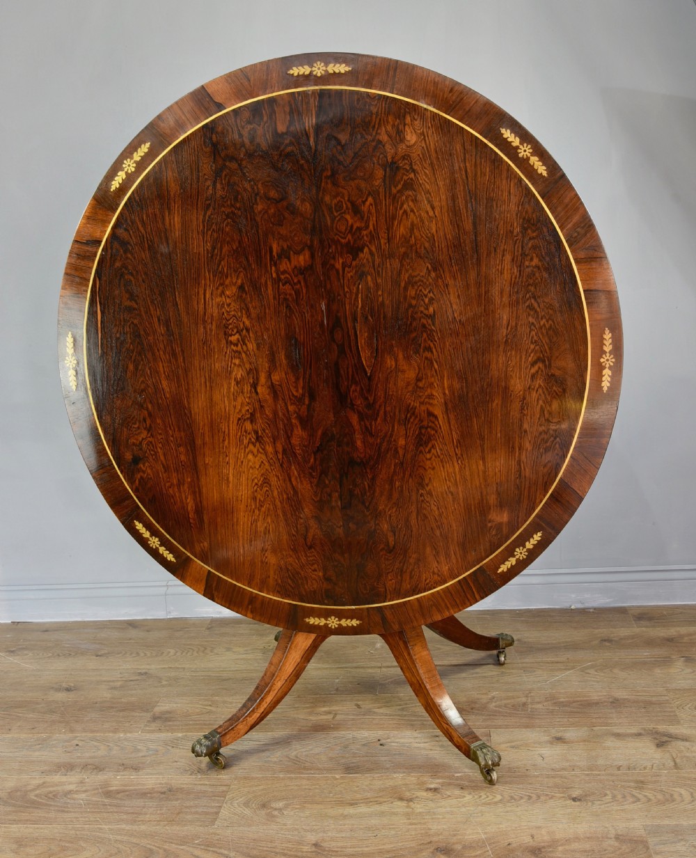 Regency rosewood brass inlaid centre table 