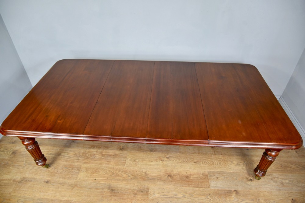 Victorian mahogany extending dining table seats ten  View II