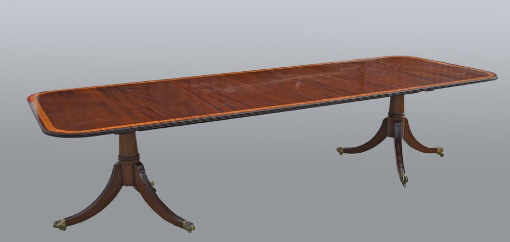 Regency style mahogany dining table and 10 chairs  View II