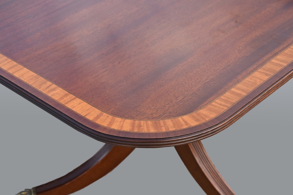 Regency style mahogany dining table and 10 chairs  View IV