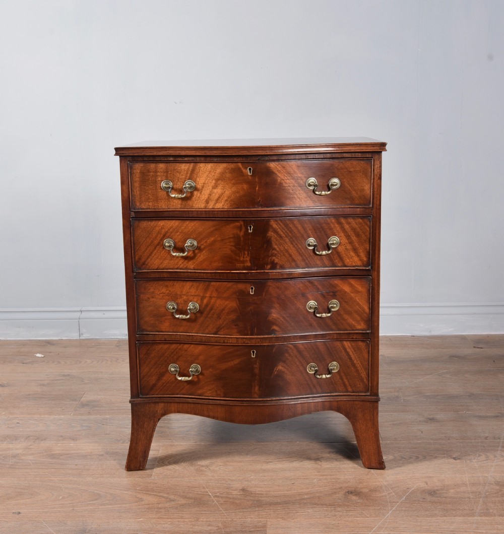 Antique mahogany serpentine chest of drawers 