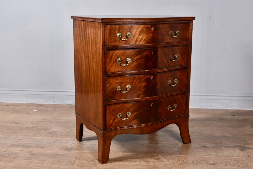 Antique mahogany serpentine chest of drawers  View II