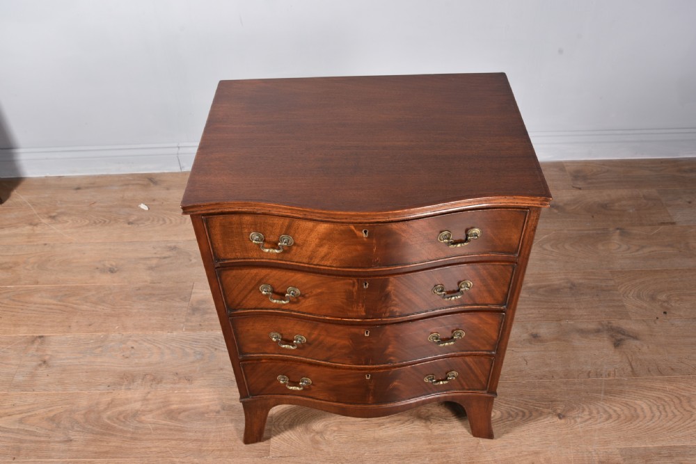 Antique mahogany serpentine chest of drawers  View III
