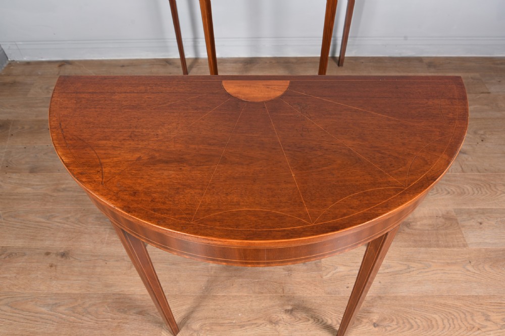 pair of Georgian mahogany Demi lune console tables  View II