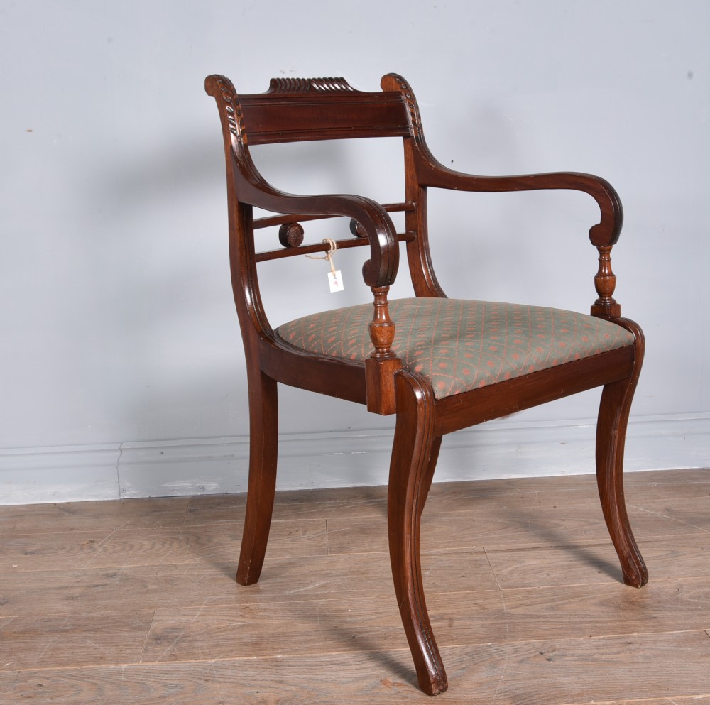 Regency style mahogany dining table and twelve chairs  View V