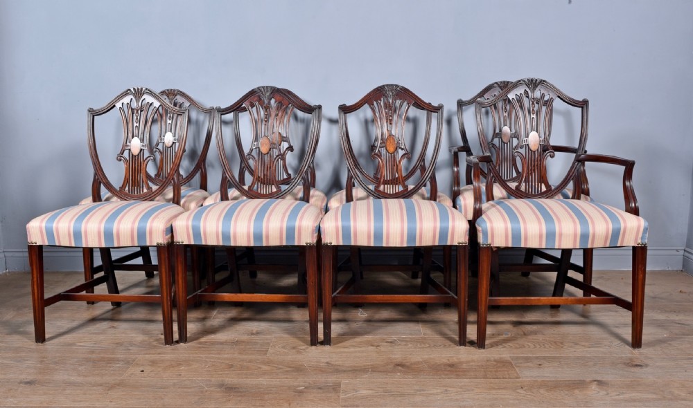 Set of eight Sheraton revival mahogany dining chairs 