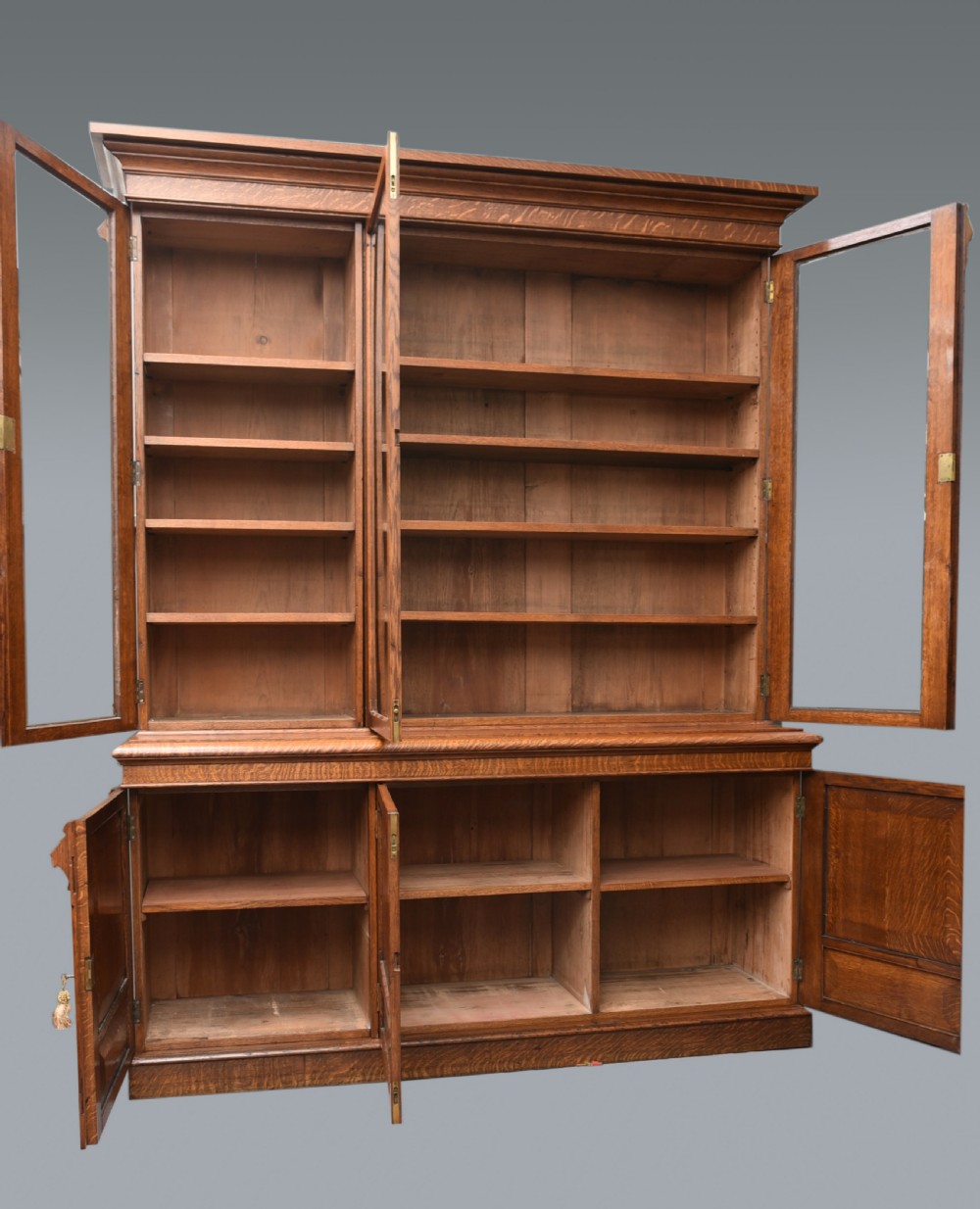 Large Arts and Crafts carved oak library bookcase  View II