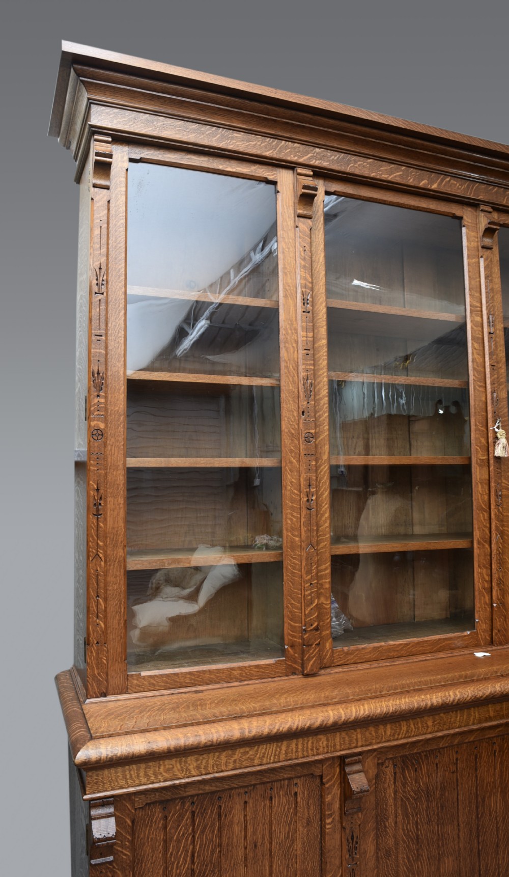 Large Arts and Crafts carved oak library bookcase  View III