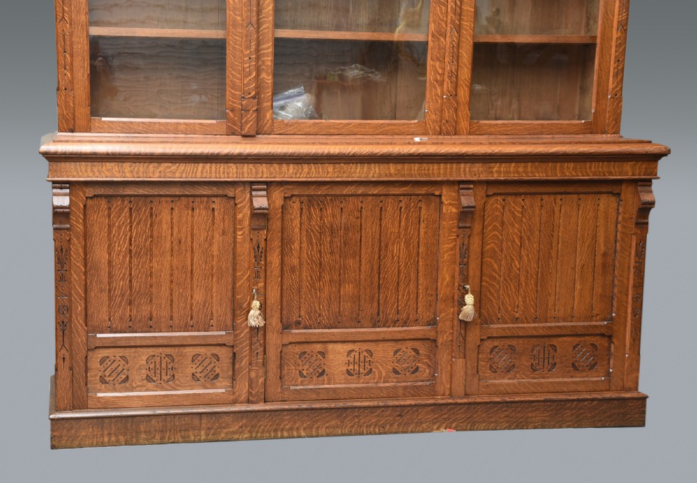 Large Arts and Crafts carved oak library bookcase  View V