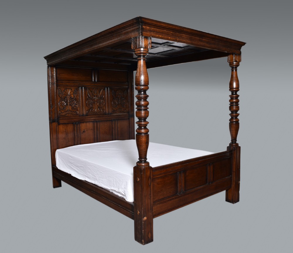 carved oak 17th century style four poster bed 