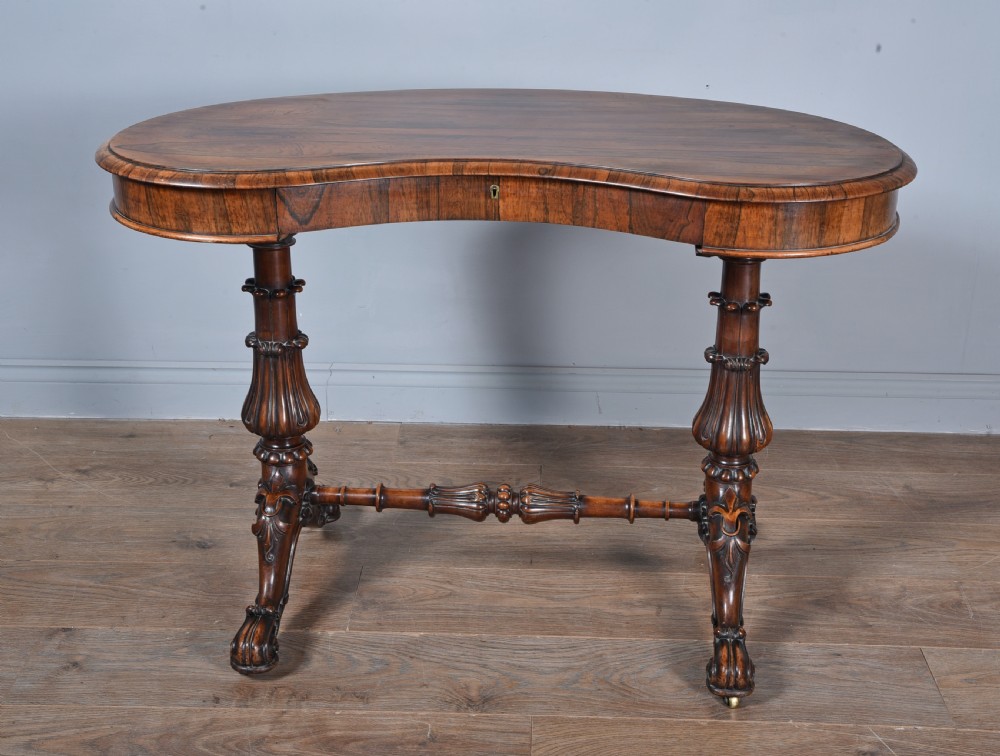 Antique Kidney shaped rosewood writing table 