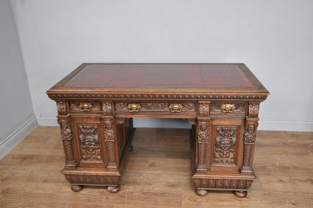 Victorian carved oak pedestal desk 