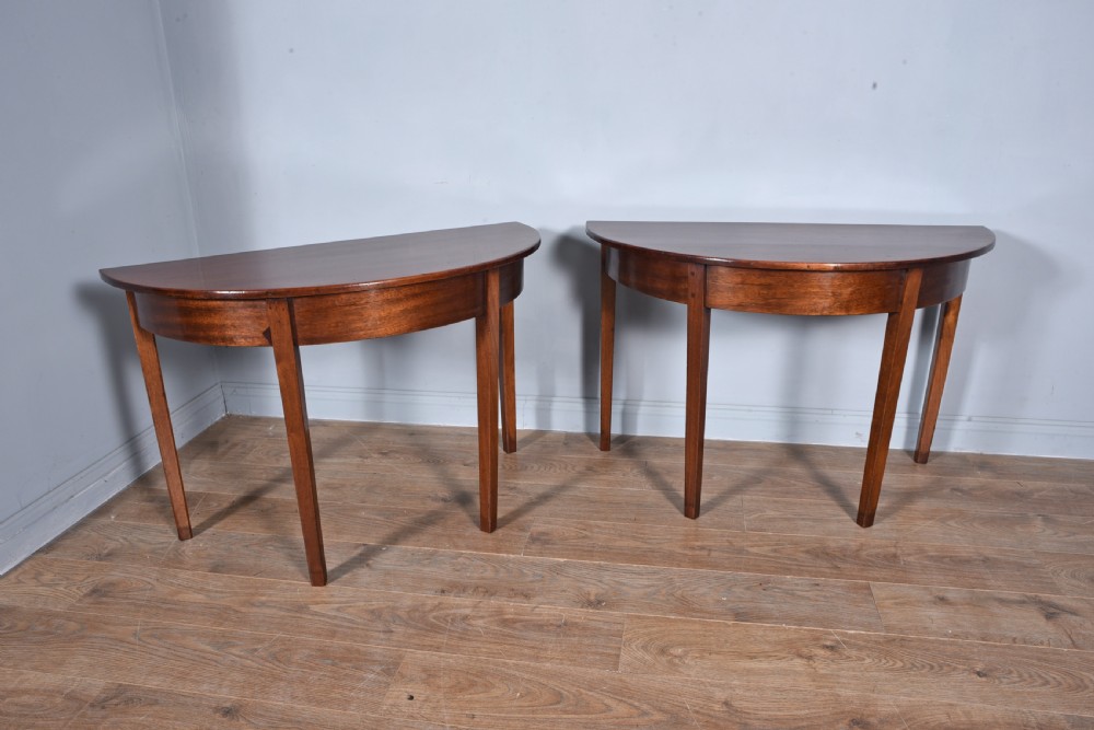 pair of Georgian mahogany Demi lune console tables 