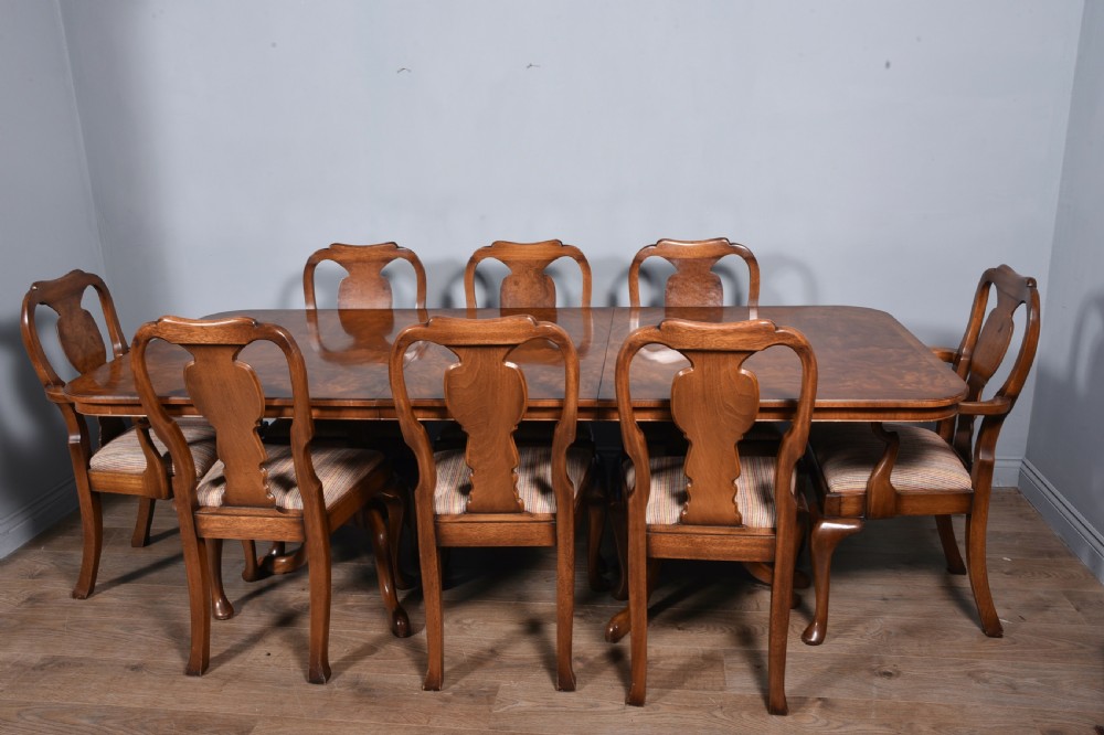 walnut dining table and eight chairs 