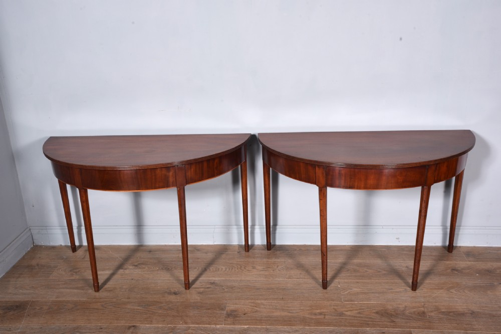 Antique pair of Georgian mahogany demi lune console tables 