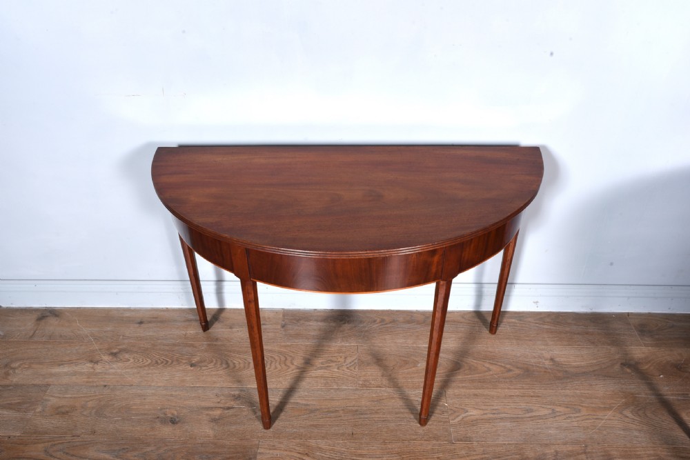 Antique pair of Georgian mahogany demi lune console tables  View II